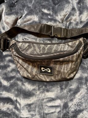 NFINITY Black Glitter Zebra Print Crossbody Waist Bag